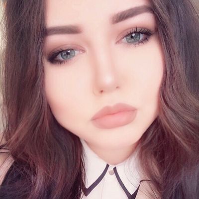 Оля Корикова